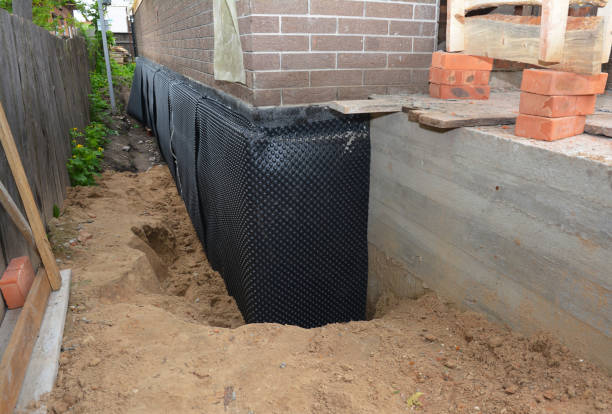 Happy homeowners after waterproofing job in Saint Clair Shores